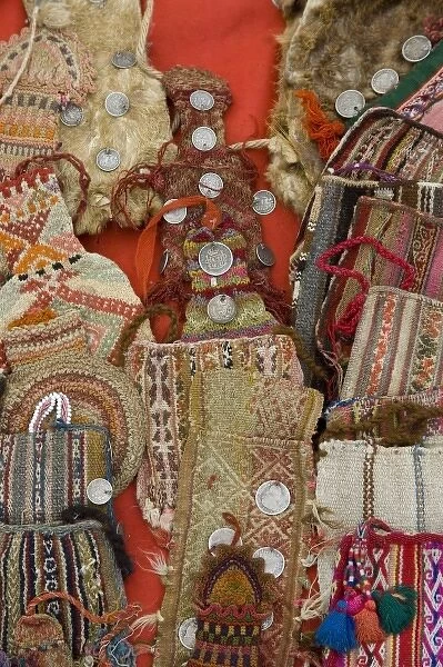 Old woven purses displayed in market, Chinchero (near Cuzco), Peru