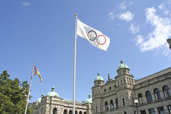 Olympic flag and Parliament Building Victoria British Columbia