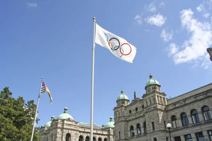 Framed Print : Olympic flag and Parliament Building Victoria British Columbia