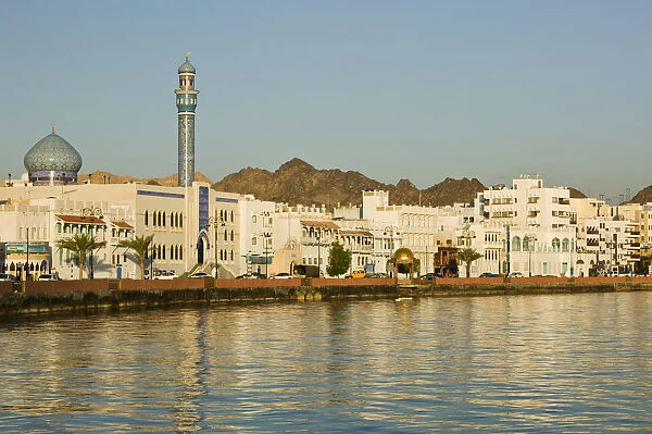 Oman, Muscat, Mutrah. Mutrah Corniche- Buildings aong the Corniche  /  Morning
