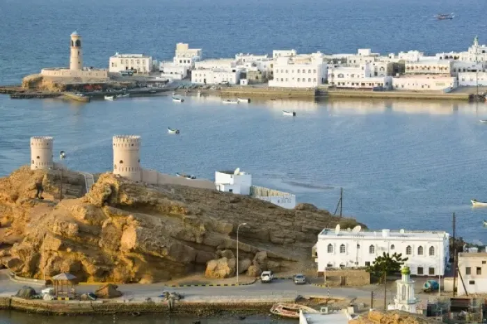 Framed Print : Oman, Sharqiya Region, Sur. Towers of Al Ayajh Fort  /  Sur Bay  /  Late Afternoon