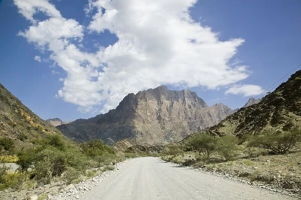 Oman, Western Hajar Mountains, Az Zammah. Dirt Road over Wadi Bani Awf Riverbed
