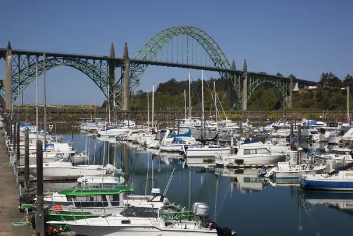 Framed Print : OR, Newport, marina with pleasure boats and Yaquina Bay Bridge in background Framed Print : OR, Newport, marina with pleasure boats and Yaquina Bay Bridge in background