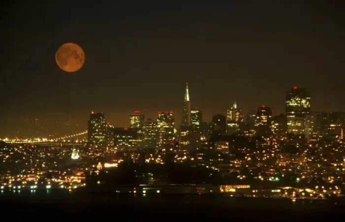 Framed Print : An orange full moon rises over the San Francisco cityscape