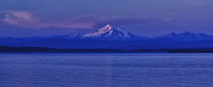 Framed Print : Orcas Island, USA - Mt. Baker and the Cascade Range backdrop the Puget Sound at dusk