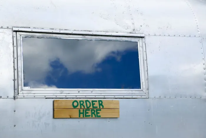 Framed Print : Order here sign on a vintage trailer, Phoenicia, New York, USA