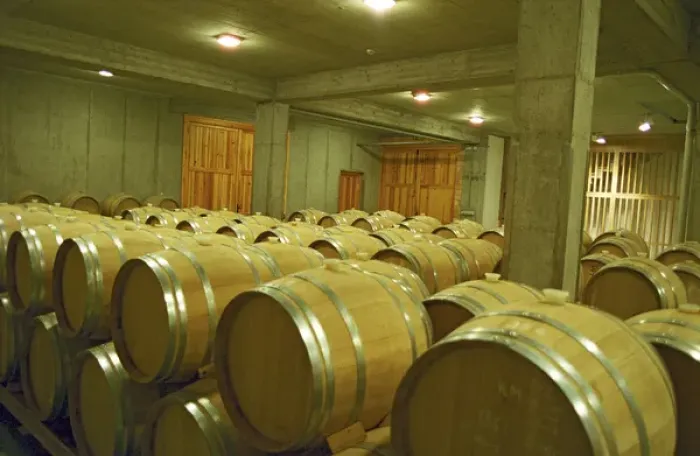 Framed Print : The Oremus winery in Tolcsva, Tokaj: The wood aging cellar with new oak barrels for Framed Print : The Oremus winery in Tolcsva, Tokaj: The wood aging cellar with new oak barrels for