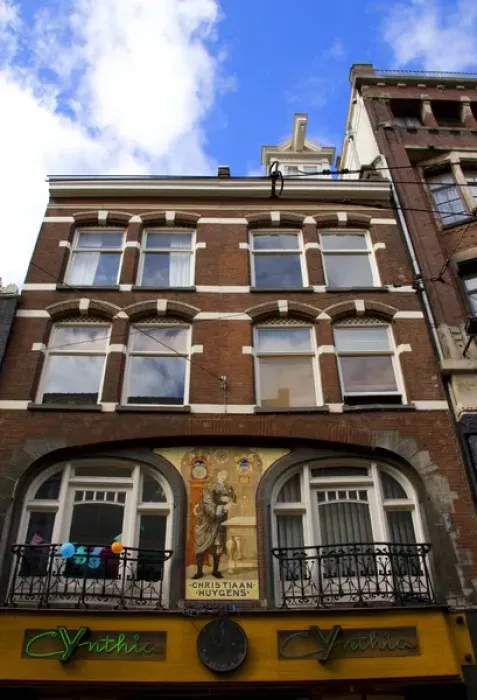Framed Print : An ornate building decorated with a mosaic of tiles of Christiaan Huygens, the Dutch