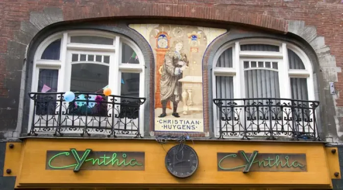 Framed Print : An ornate building decorated with a mosaic of tiles of Christiaan Huygens, the Dutch