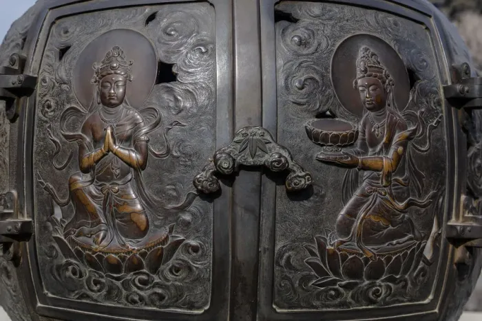 Framed Print : The ornate, engraved bronze doors to the outdoor incense burner of the Daibutsu, Kamakura