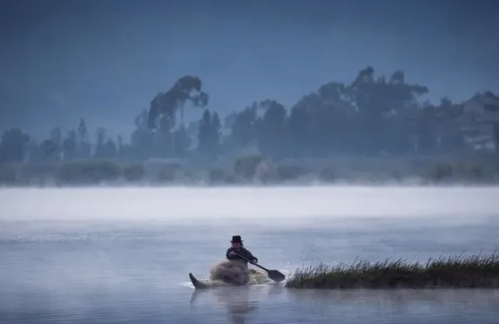 Framed Print : Otavalo Indian Fisherman using Tradition Reed Boat, Lake San Pablo near Otavalo, Andes