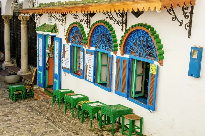 Framed Print : Outdoor cafe along a narrow street in the Bab Haha district of Kasbah, Old Medina, Tangier, Morocco, Africa. (Editorial Use Only)