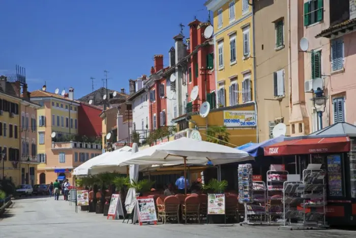 Framed Print : Outdoor cafes and colorful buildings, Rovigno, Croatia