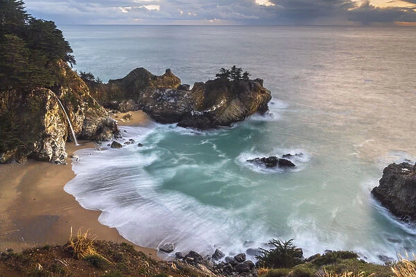 Overview of golden light on McWay Falls, Big Sur