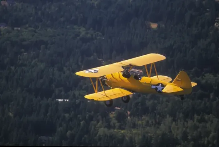 Framed Print : P. R. Yellow Biplane, 1944 Stearman PT-17, flying over Puget Sound, WA Framed Print : P. R. Yellow Biplane, 1944 Stearman PT-17, flying over Puget Sound, WA