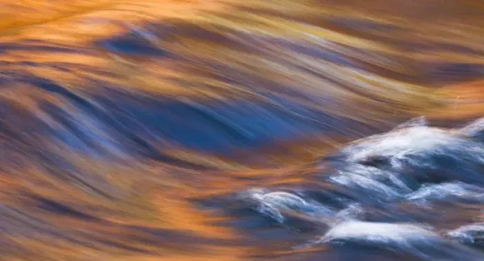 Framed Print : Painterly Impression of a rushing stream reflecting autumn colors Framed Print : Painterly Impression of a rushing stream reflecting autumn colors