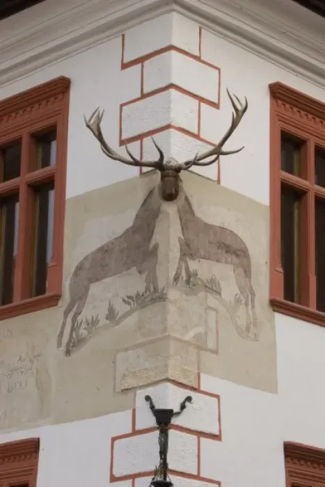 Framed Print : Painting and curving of an Elk in the old medieval city os Sighisoara. The notorious Vlad Tepes