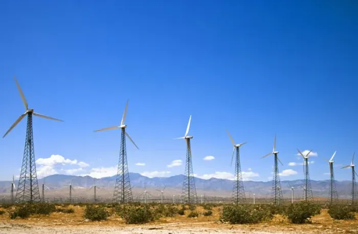 Framed Print : Palm Springs, CA, USA - Wind turbines in a desert landscape with rocky hills in the background