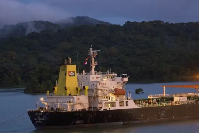 Framed Print : Panama, Panama Canal, ship in Panama Canal, rainforest in the background Framed Print : Panama, Panama Canal, ship in Panama Canal, rainforest in the background