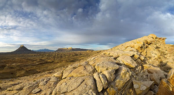 Panoramic of Factory Butte, The Henry Mountains and North Cainevile Mesa from the