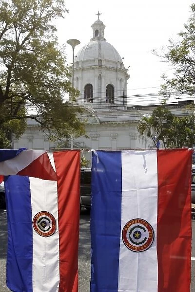 Panteon de los Heroes and Paraguayan flags for sale. Asuncion is the capital of Paraguay
