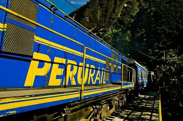 Passenger trains run right down the main street of the small village of Aguas Calientes