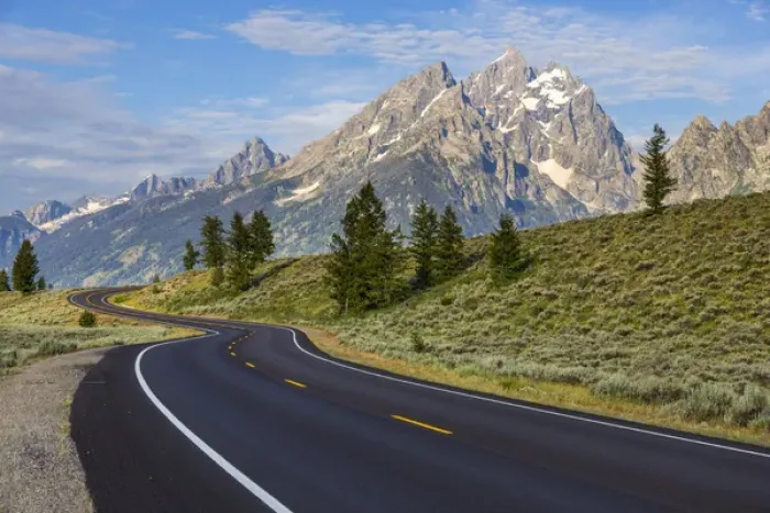Framed Print : Empty paved roadway in Grand Teton National Park, Wyoming, USA