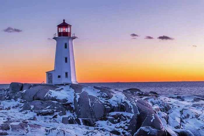 Framed Print : Peggy's Cove Lighthouse in winter at sunset, Nova Scotia, Canada