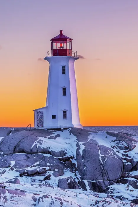 Framed Print : Peggy's Cove Lighthouse in winter at sunset, Nova Scotia, Canada. (Editorial Use Only) Framed Print : Peggy's Cove Lighthouse in winter at sunset, Nova Scotia, Canada. (Editorial Use Only)