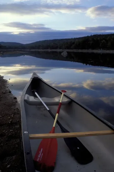 Framed Print : Pemadumcook Lake, ME. Northern Forest. Canoeing. A canoe rests on the shore Framed Print : Pemadumcook Lake, ME. Northern Forest. Canoeing. A canoe rests on the shore