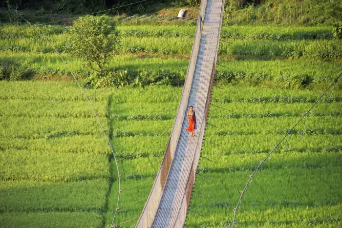 Framed Print : People crossing suspension bridge over Trishuli River, Tupche, Nuwakot District