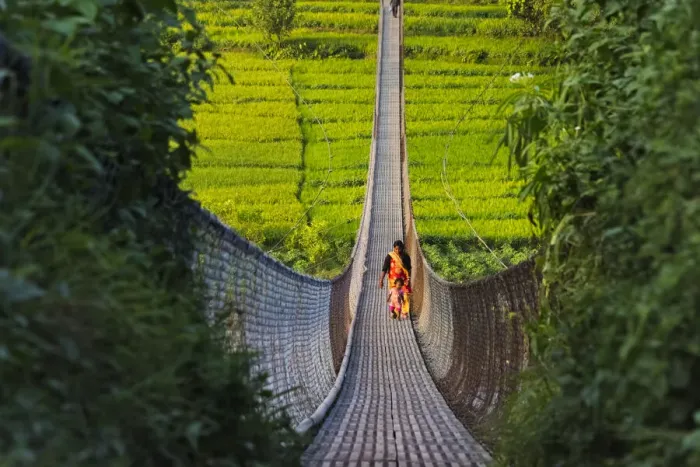 Framed Print : People crossing suspension bridge over Trishuli River, Tupche, Nuwakot District