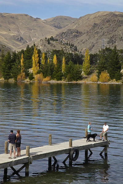 People on jetty, Lake Dunstan, Cromwell, Central Otago, South Island, New Zealand