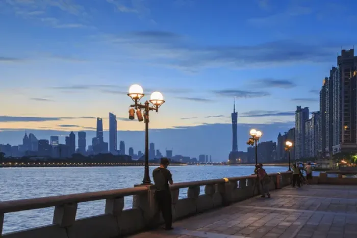 Framed Print : person on smarphone, view along Pearl River of city skyline from Yacht Club, Guangzhou