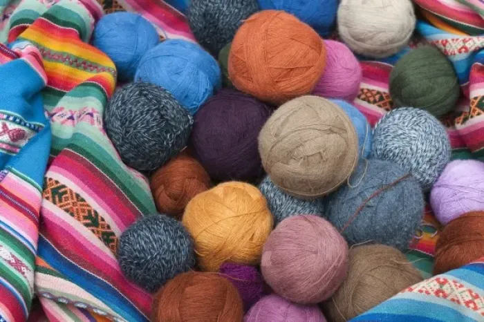 Framed Print : Peru, Chincheros. Dyed llama wool at the local artisan coop workshop Framed Print : Peru, Chincheros. Dyed llama wool at the local artisan coop workshop