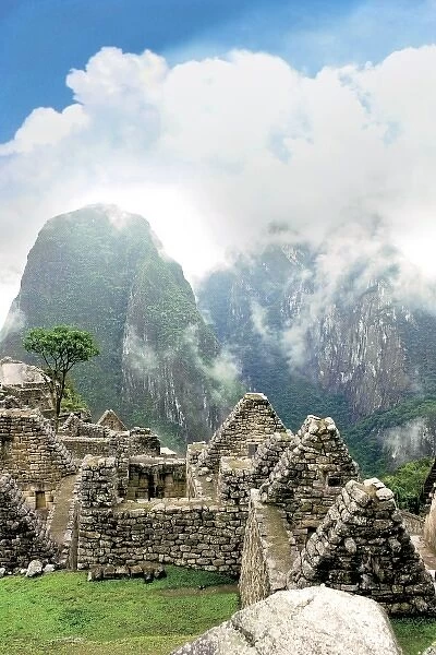Peru, Machu Picchu, the ancient lost city of the Inca shrouded in mist and clouds