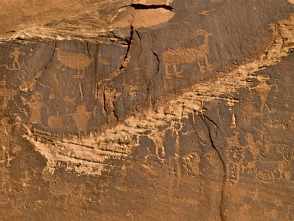 Petroglyphs -- Native American rock art on cliffs along Colorado River near Moab, UT