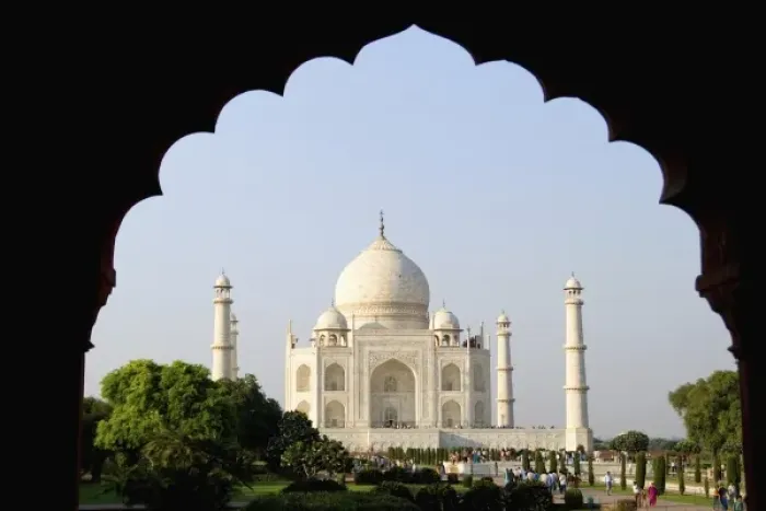 Framed Print : Photograph through a doorway showing sunrise at the famous Taj Mahal one of the wonders Framed Print : Photograph through a doorway showing sunrise at the famous Taj Mahal one of the wonders