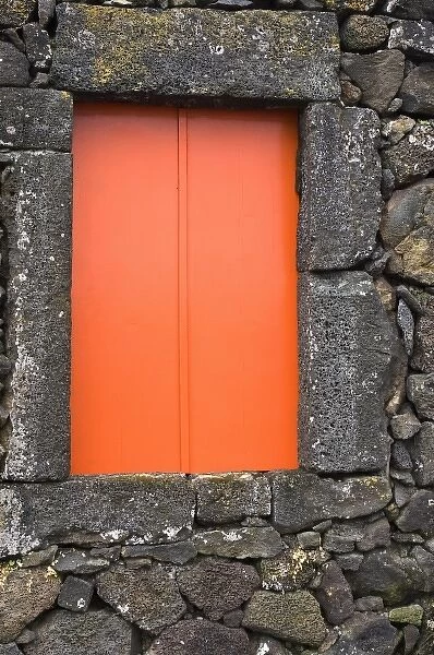 Pico, Azores, Portugal. Colorful window in stone house