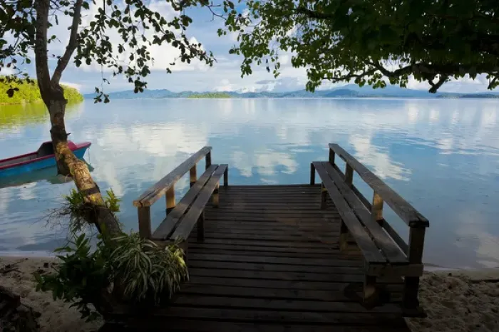 Framed Print : Pier of an ecolodge above the water of the Marovo Lagoon, Salomon Islands, Pacific