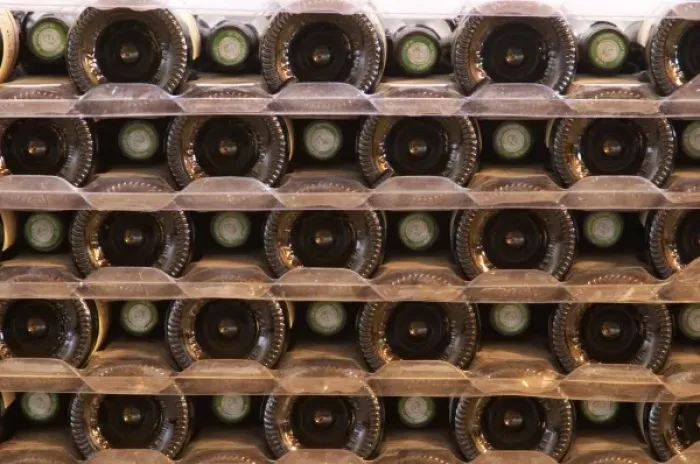 Framed Print : A pile of bottles stacked high with the bottle bottoms and bottle necks. Tax stamp Framed Print : A pile of bottles stacked high with the bottle bottoms and bottle necks. Tax stamp