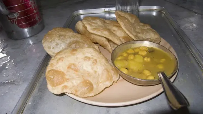 Framed Print : Plate of Indian fried bread (nan) and dal in northeastern India