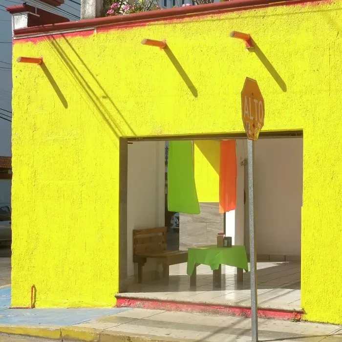 Framed Print : Playa del Carmen, Mexico. Bight yellow cafe on the street Framed Print : Playa del Carmen, Mexico. Bight yellow cafe on the street