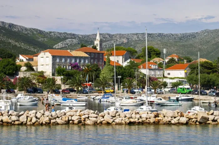 Framed Print : The pleasure boat harbour and the village. Orebic town, holiday resort on the south