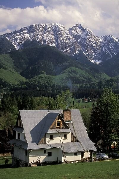 Poland, Carpathian Mountains, Zakopane. View of chalet and Tatra Mountains
