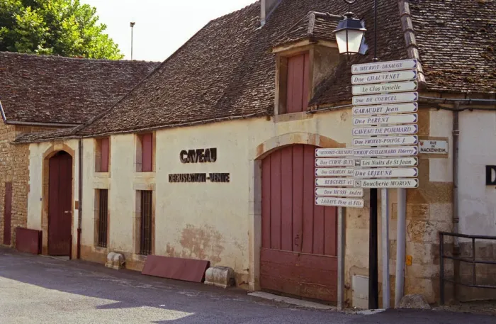 Framed Print : The Pommard village, with wine shop and many signs indicating several wine producers