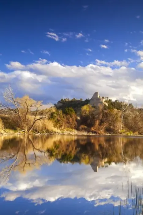 Framed Print : Pond reflects hills and bluffs at the Buffalo Creek Wildlife Management Area near Scottsbluff