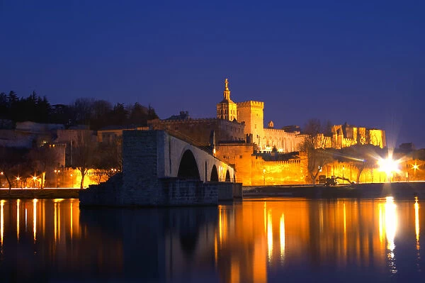 The Pont Saint St Benezet bridge in Avignon and the Popes Palace on the Rhone at sunset