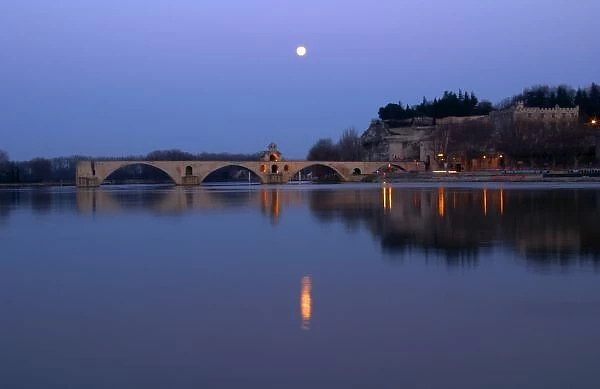 The Pont St. Benezet bridge in Avignon on the Rhone at sunset with moon, Vaucluse