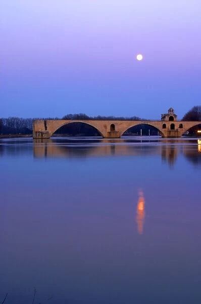 The Pont St. Benezet bridge in Avignon on the Rhone at sunset with moon, Vaucluse